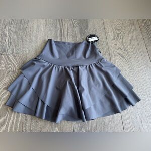 ExoticAthletica Performance High Waisted Ruffle Skort in Dark Gray Mama Shark